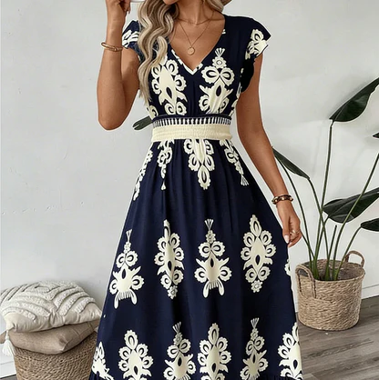 Elegantti V-aukkoinen mekko barokkikuviolla