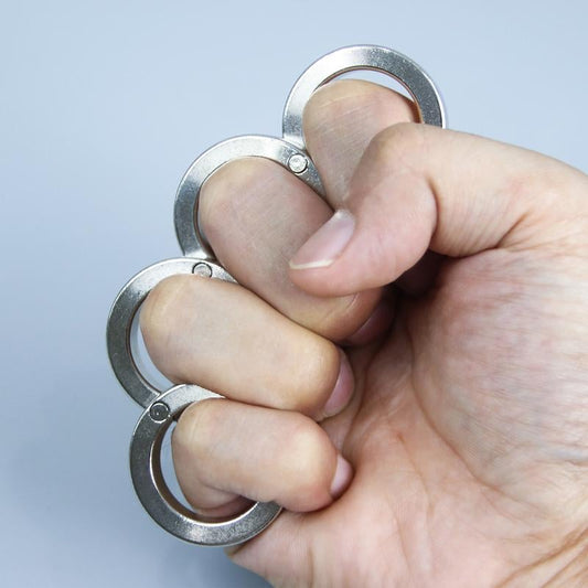 Taitettava itsepuolustusrengas