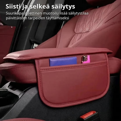 Auton keskikonsolin käsinojan suojus sivutaskuilla