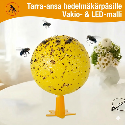 Tahmea hedelmäkärpäsansapallo jalustalla ja LED-valolla