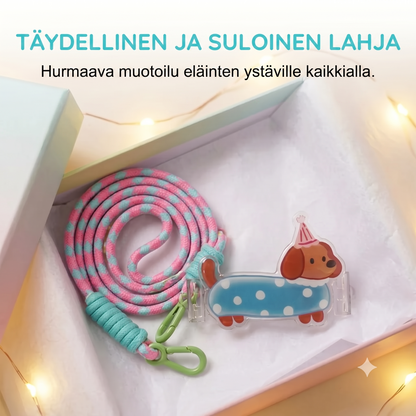 Puhelinpidike sarjakuvahahmolla ja rannelenkillä