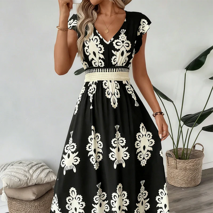 Elegantti V-aukkoinen mekko barokkikuviolla