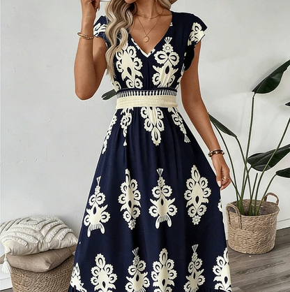 Elegantti V-aukkoinen mekko barokkikuviolla